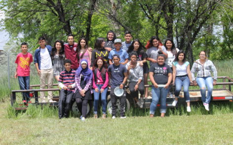 Past Imaginantes participants gather during one of their field trips. 