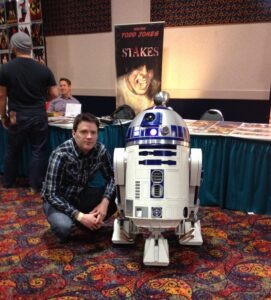 Todd Jones, creator of the comic book "Stakes," in a recent appearance with R2D2.