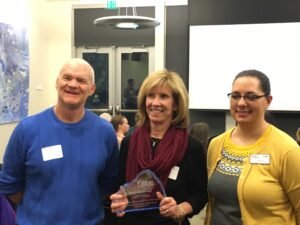 Anne Macdonald (center) pictured with Mike O'Connell, SBDC director, and Kat Rico.