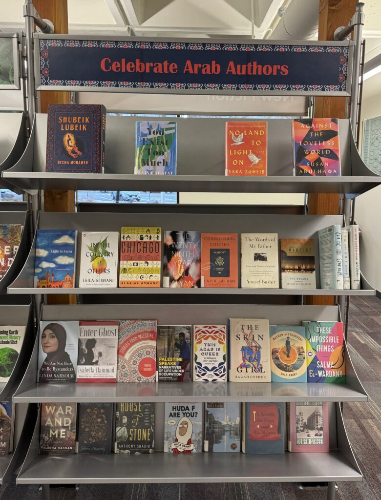 adult arab authors book display in a library